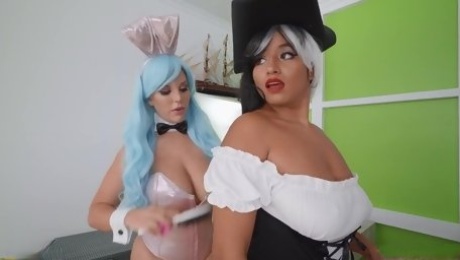 Two voluptuous ladies finger and rub each others pussies after a Halloween party.