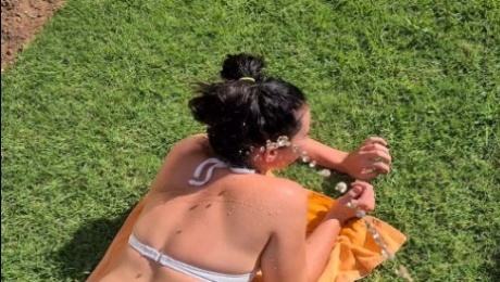 Surprise piss for tanning teen in white bikini