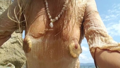 nippleringlover nude beach no bra see through wet shirt fingering pierced pussy big fat nipple rings
